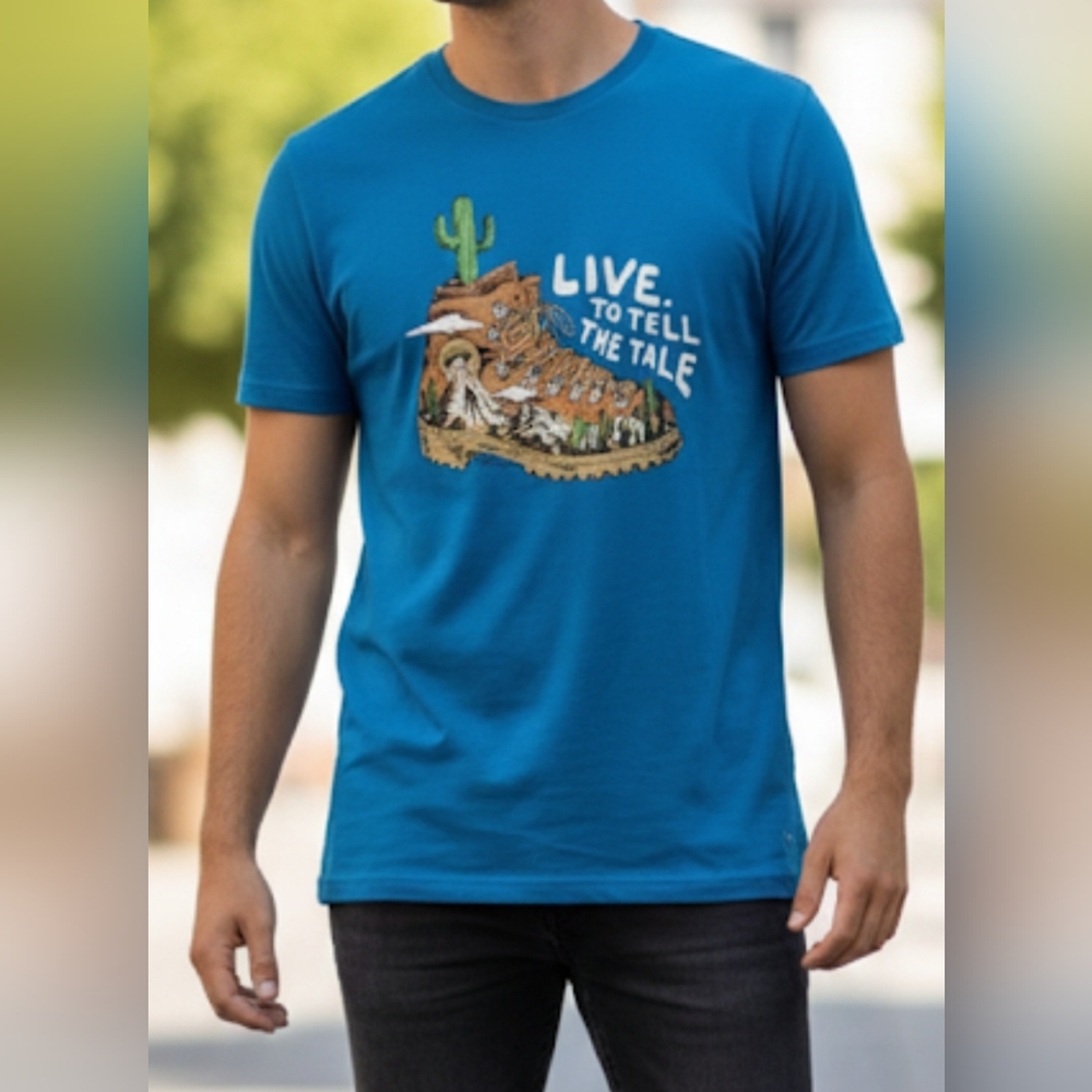 TRO T Shirt blue color size XL with an image of an adventure With A‎ Haking Boot